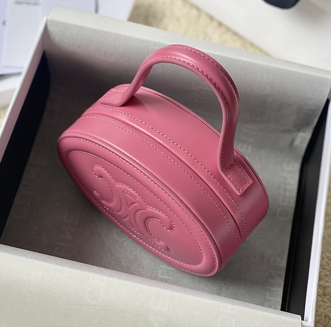 Ce**e oval minaudiere cuir triomphe