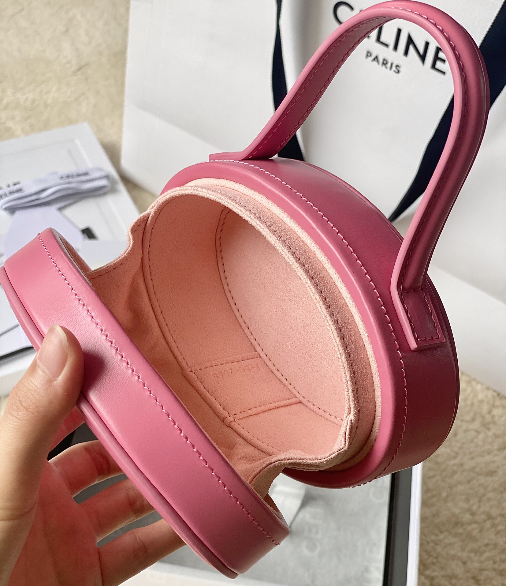 Ce**e oval minaudiere cuir triomphe