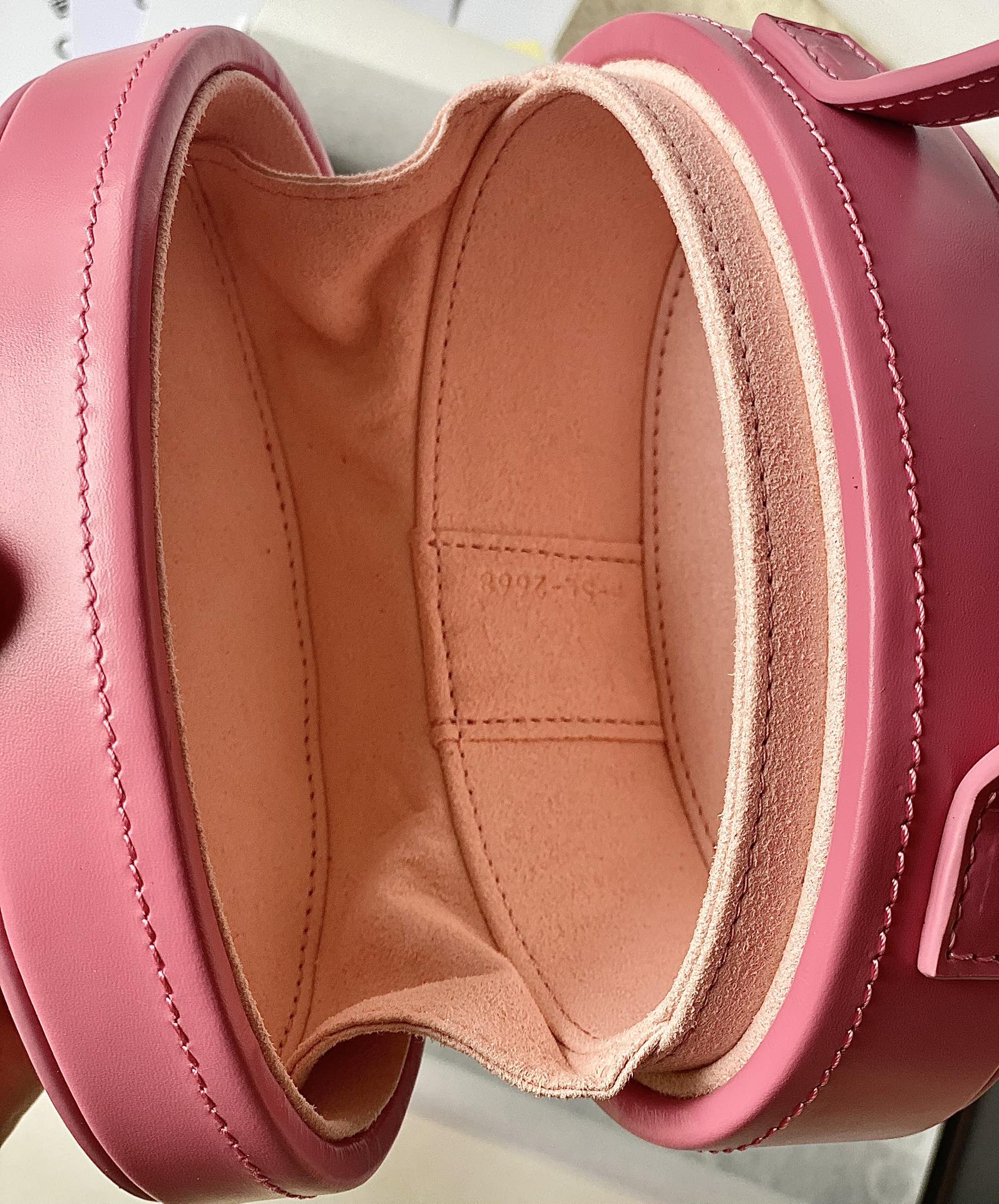 Ce**e oval minaudiere cuir triomphe